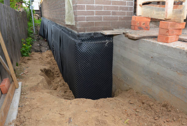 SJ Waterproofing Pros technician performing targeted Waterproofing assessment in Newberry, SC